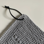 Hæklet håndklæde med perlemasker